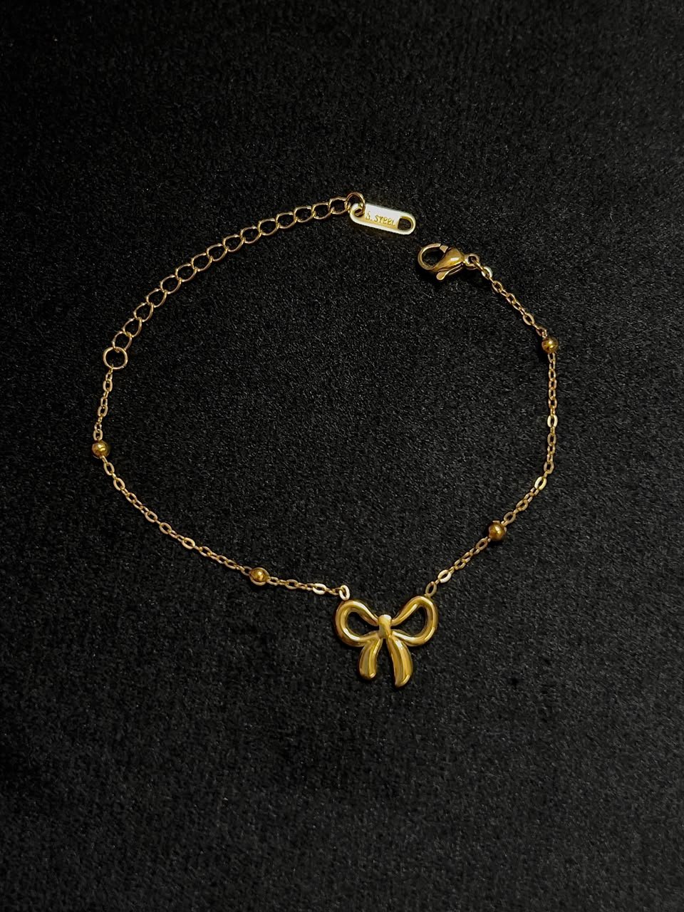 Minimal bow 18k gold plated , Anti ternish chain bracelet - Image 2